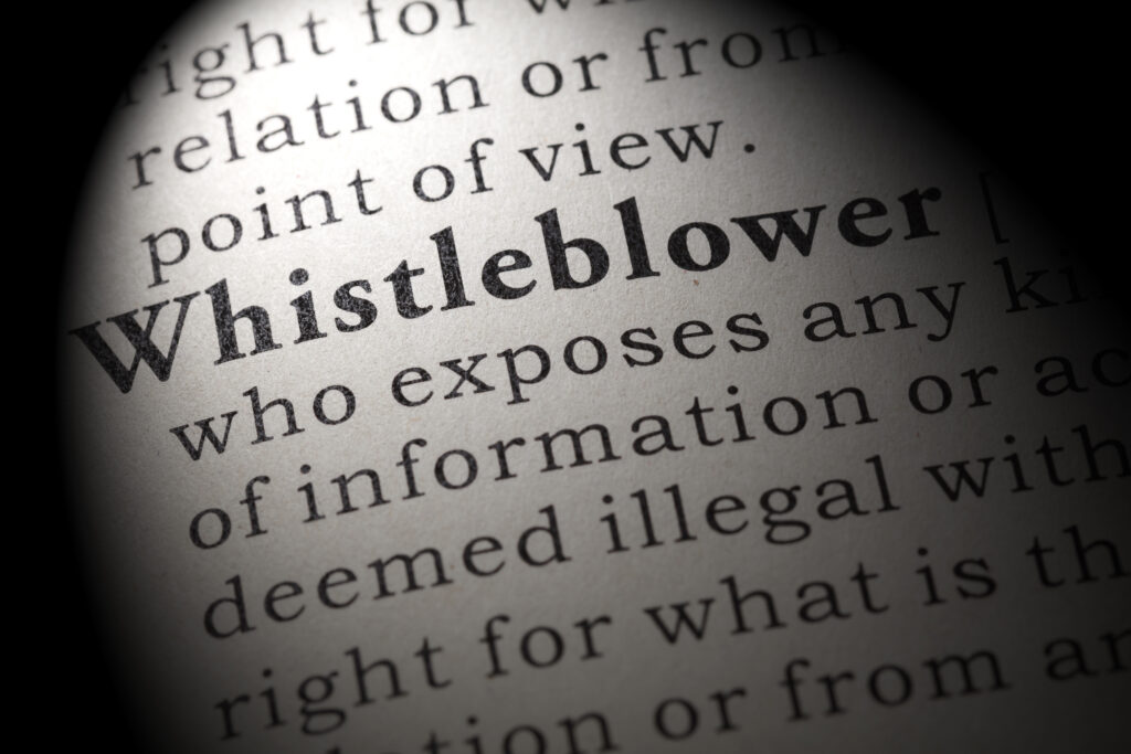 stock image. Dictionary definition of the word whistleblower.