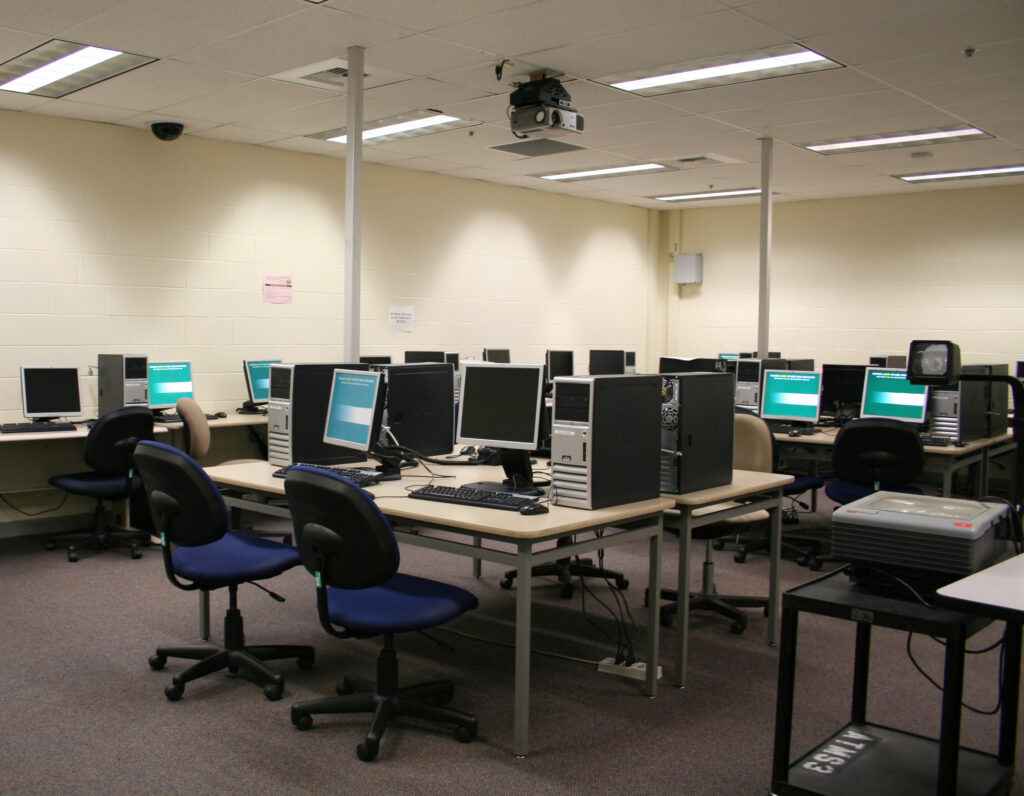 office with chairs, desks, and computers