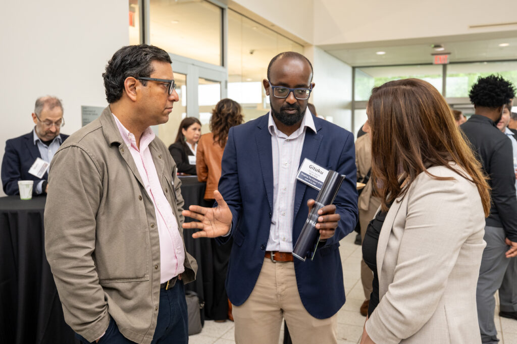3 people engaging in conversation