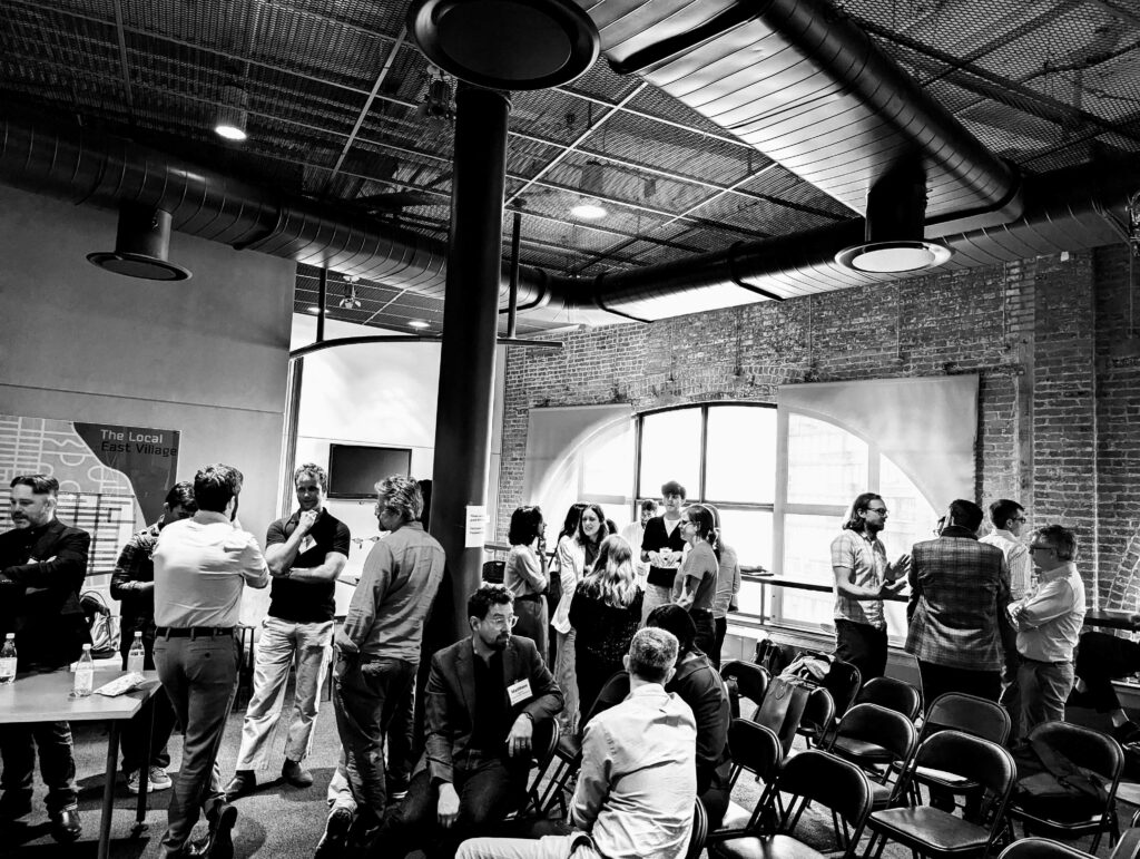 participants inside a room talking during a workshop