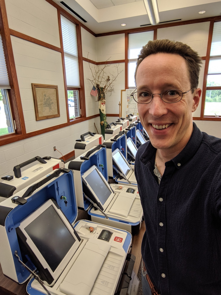 Alex Halderman with eleven unattended voting machines